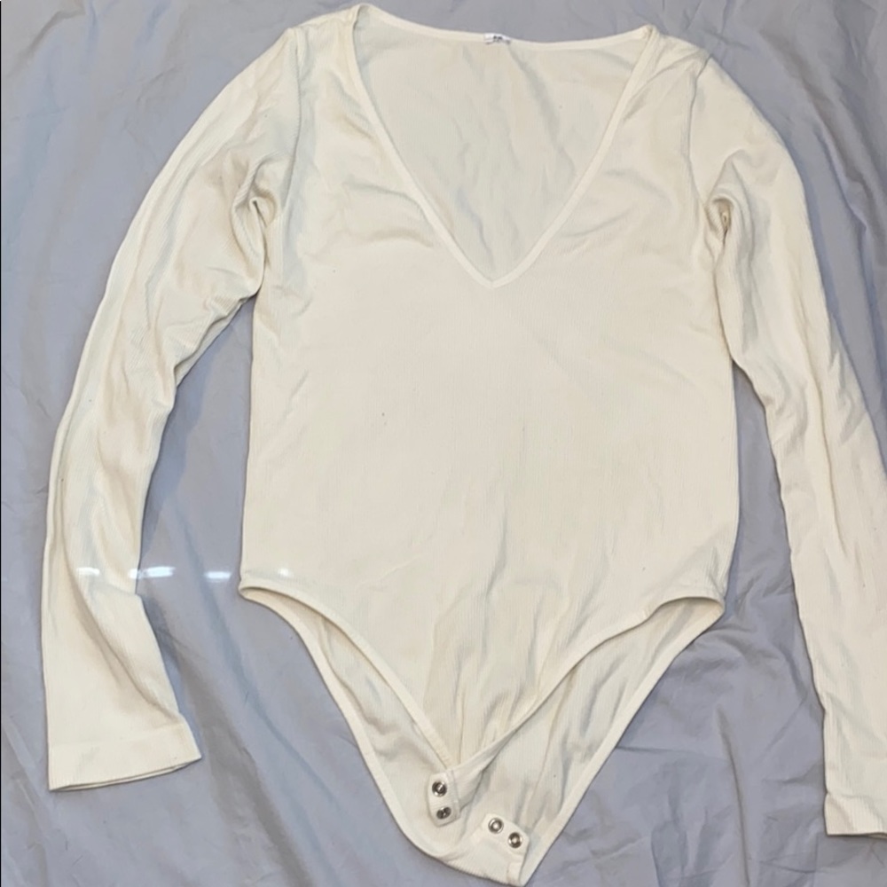 Cream Long-sleeved bodysuit cheeky